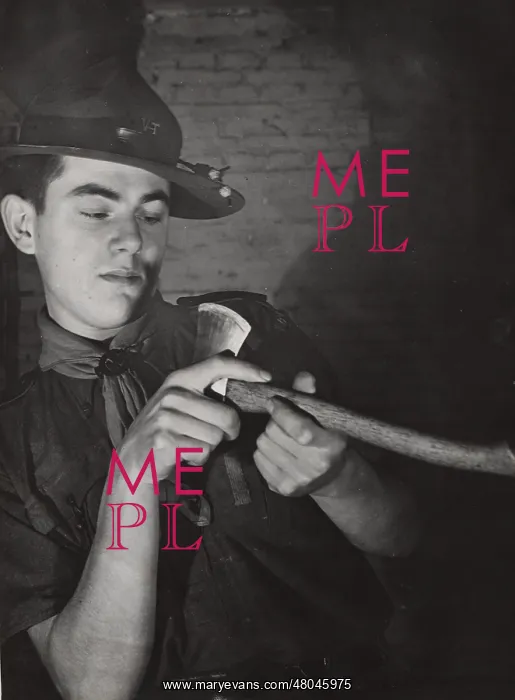  : Dutch rover scout sharpening an axe
