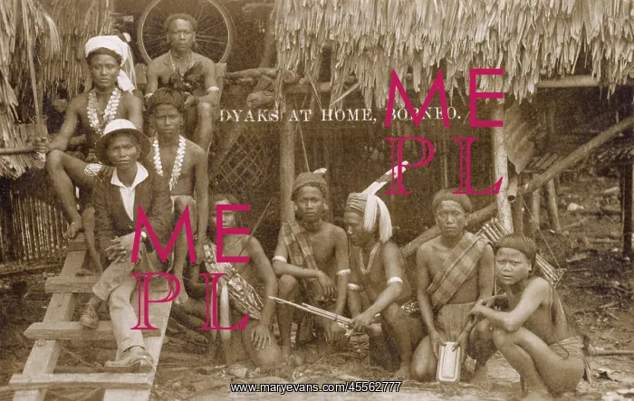 : Dyak people outside their house, Borneo : Dyak people outside their house, Borneo