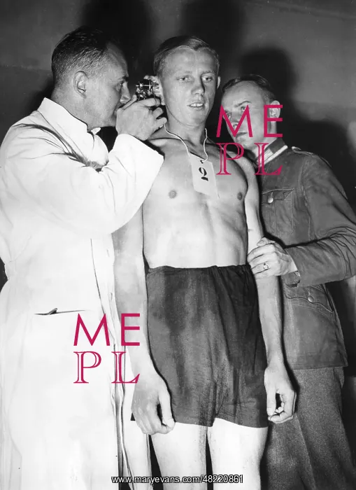 : Ear examination at a muster, 1936 : Ear examination at a muster, 1936