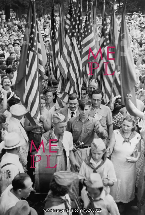 : Earl Browder surrounded by people at a Communist : Earl Browder surrounded by people at a Communist