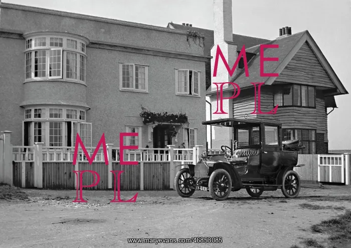 : Early car parked in front of house : Early car parked in front of house