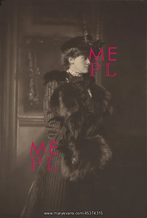 : Edith Wharton, wears a feathered hat, a fur-trimmed : Edith Wharton, wears a feathered hat, a fur-trimmed