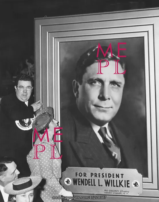 : Edith Willkie looks up at the oversized portrait : Edith Willkie looks up at the oversized portrait