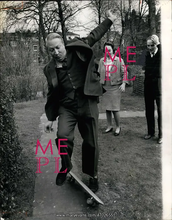 : Edward Heath trying out a skateboard : Edward Heath trying out a skateboard