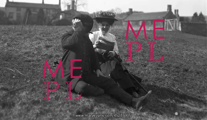 : Edwardian couple in field : Edwardian couple in field