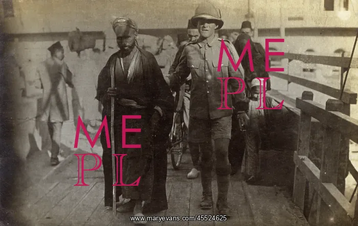 : Egypt - British Soldier escorting an old blind Arab man : Egypt - British Soldier escorting an old blind Arab man