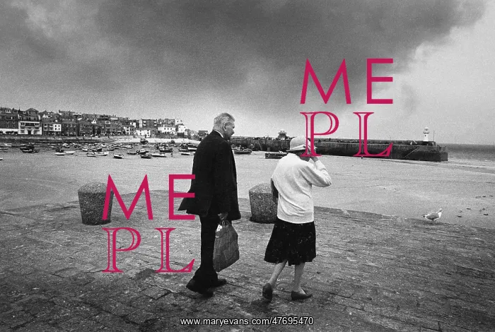 : Elderly couple brave strong winds, West Pier, St Ives : Elderly couple brave strong winds, West Pier, St Ives