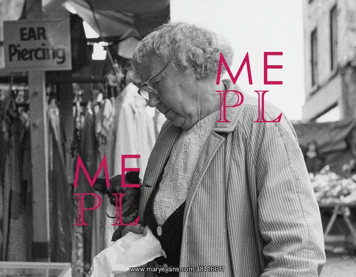 : Elderly lady and small pet dog : Elderly lady and small pet dog