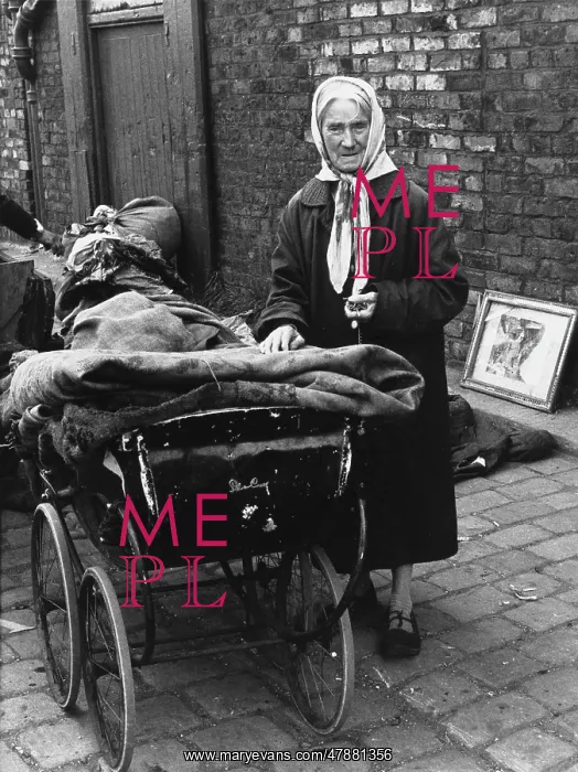 : Elderly rag lady with Silver Cross Pram : Elderly rag lady with Silver Cross Pram