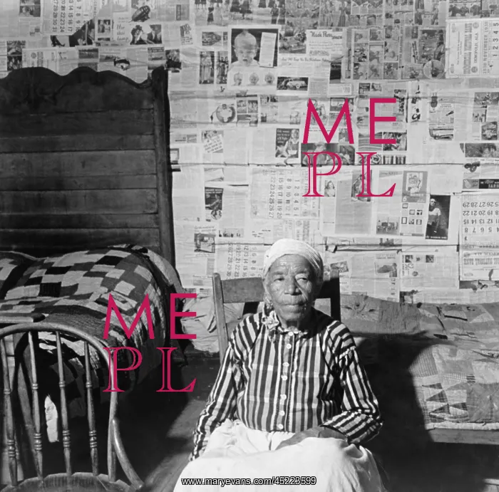 : Elderly former slave in her sitting in her ? : Elderly former slave in her sitting in her ?