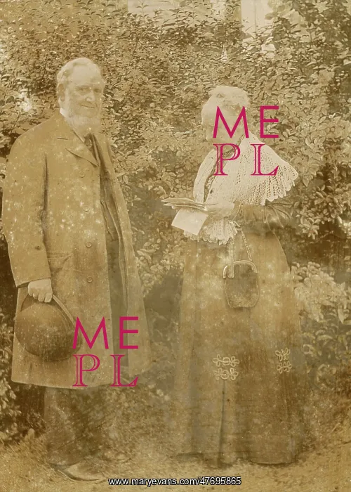: Elderly Victorian couple in a garden : Elderly Victorian couple in a garden