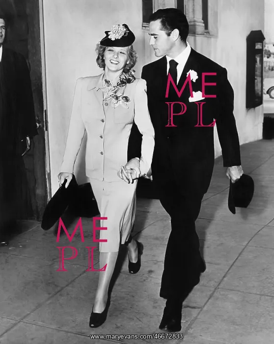 : Elegant couple walking together hand in hand : Elegant couple walking together hand in hand