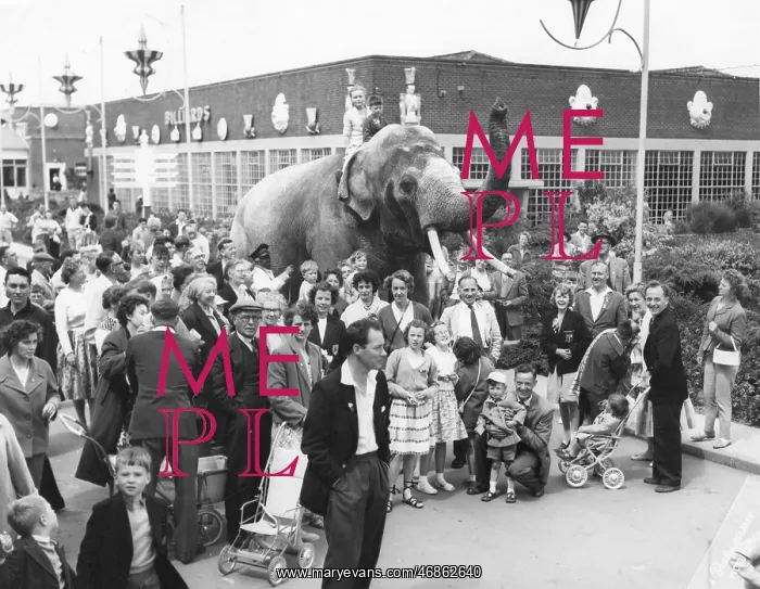 : An elephant with holidaymakers at Butlins, Filey : An elephant with holidaymakers at Butlins, Filey