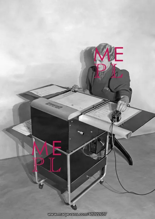  : Employee at an electric database, 1938