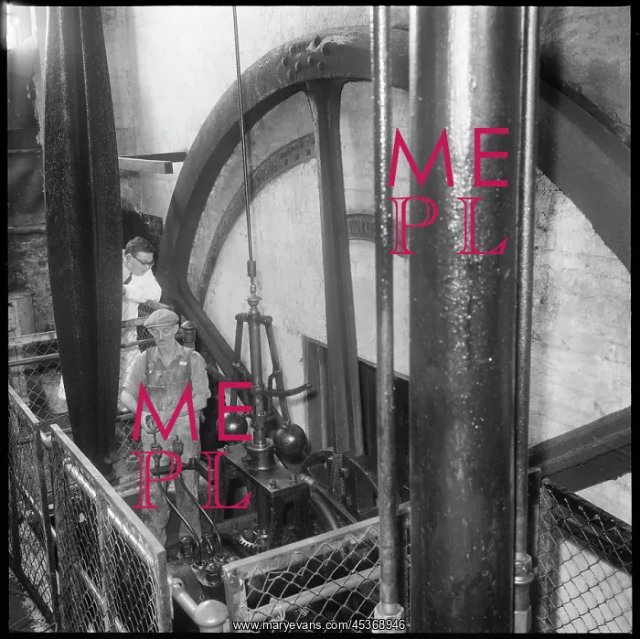 : The mill engineer adding oil to Princess, the : The mill engineer adding oil to Princess, the