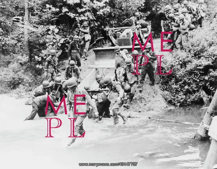 : Engineers putting a culver into place with : Engineers putting a culver into place with