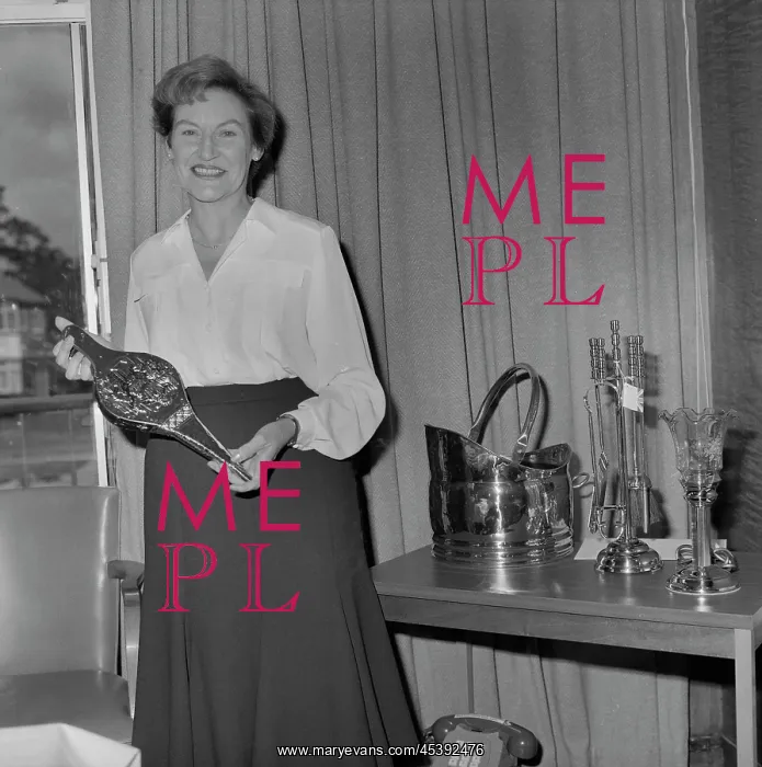 : England - A portrait of Mary Coldicott holding a brass ornamental gift : England - A portrait of Mary Coldicott holding a brass ornamental gift