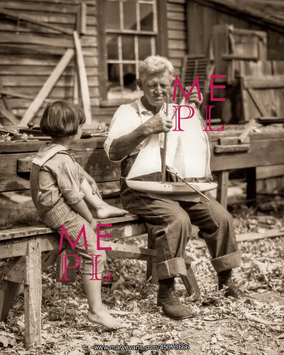 : Engrossed Young Boy in Sailor Suit sitting with Elderly : Engrossed Young Boy in Sailor Suit sitting with Elderly