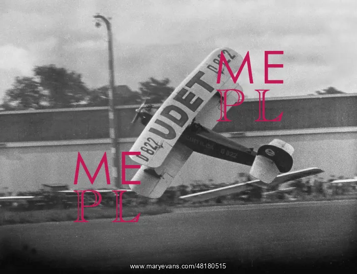 : Ernst Udet during aerobatics, 1935 : Ernst Udet during aerobatics, 1935