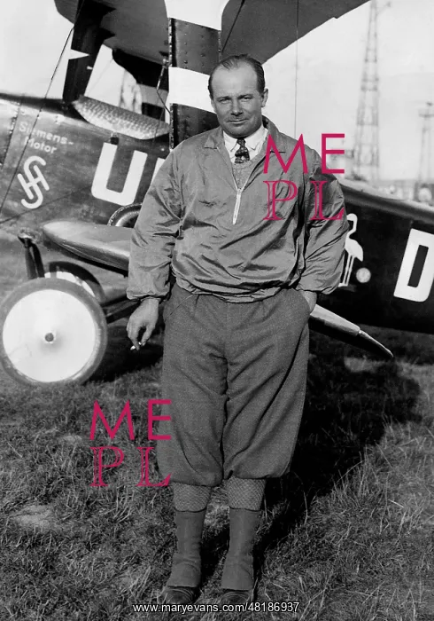 : Ernst Udet with his biplane, 1932 : Ernst Udet with his biplane, 1932