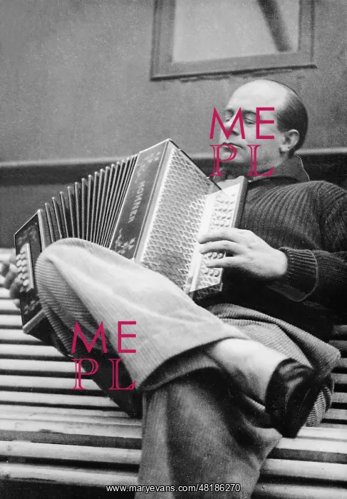 : Ernst Udet playing the accordion : Ernst Udet playing the accordion