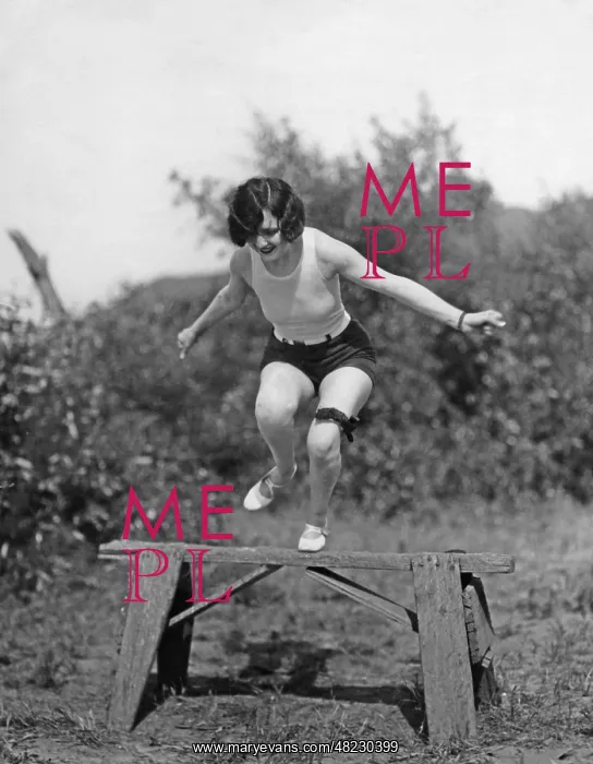 : Ethlyn Claire jumps over a dowel, 1927 : Ethlyn Claire jumps over a dowel, 1927