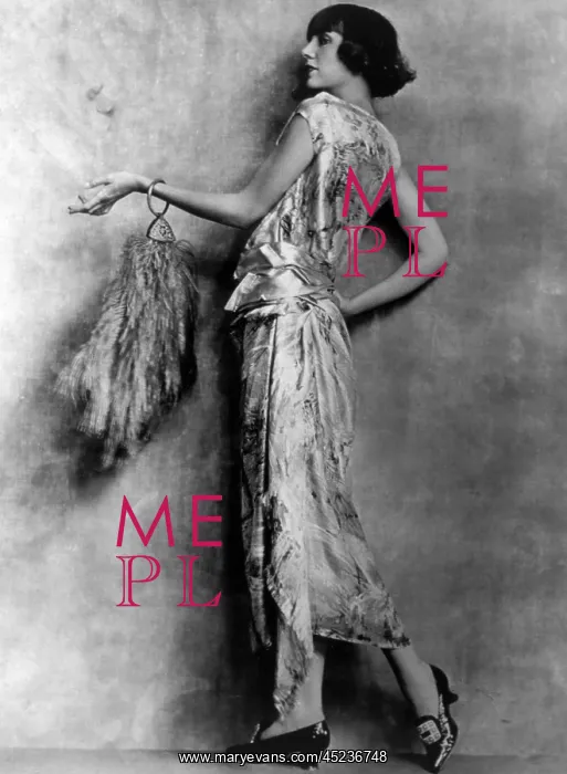 : Evening gown of brocaded satin and feathered ? : Evening gown of brocaded satin and feathered ?