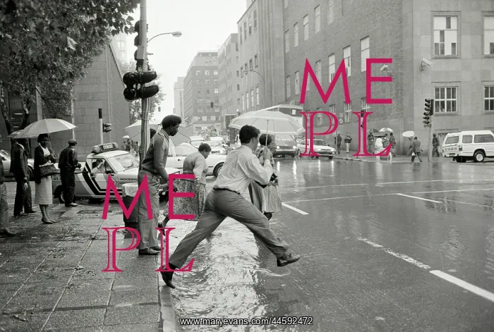 : Everyday life in the city. Leaping across puddles : Everyday life in the city. Leaping across puddles