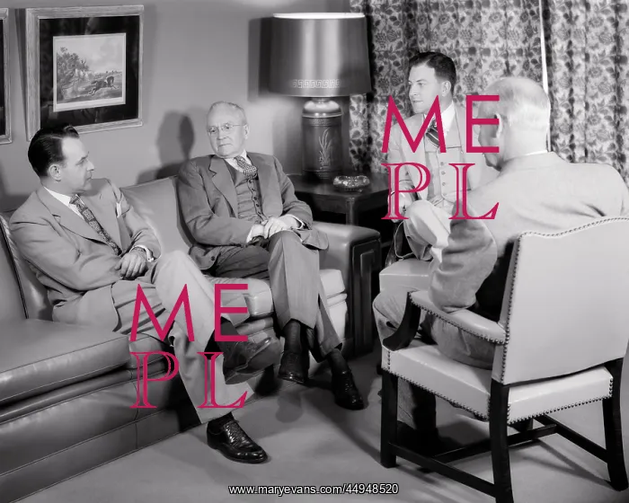 : Four Executive Men Having a Discussion Seated : Four Executive Men Having a Discussion Seated
