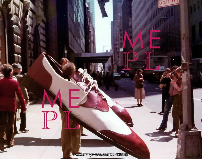 : Exhibition image of men wearing large shoes : Exhibition image of men wearing large shoes