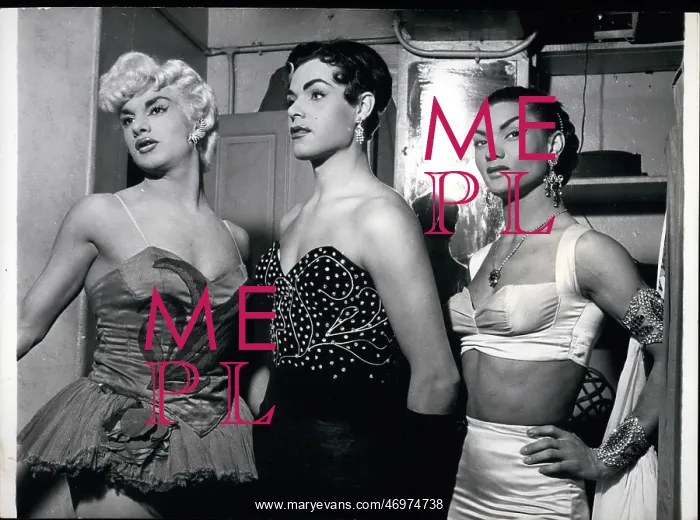  : Exotic. Mar. 02 Waiting for Their Call. Three of the impersonators wait