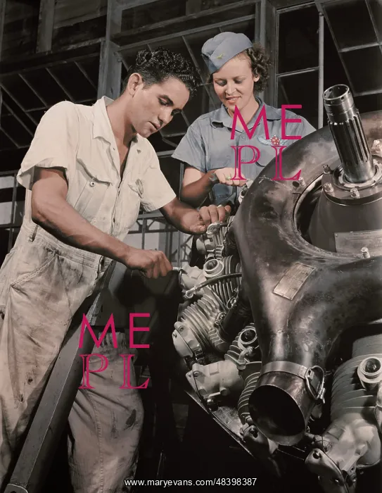 : An expert mechanic shows a student the tricks : An expert mechanic shows a student the tricks