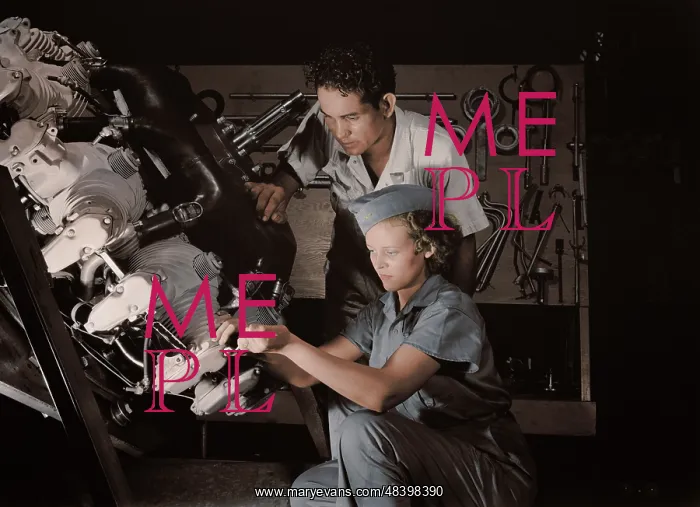 : An expert mechanic shows a student the tricks : An expert mechanic shows a student the tricks