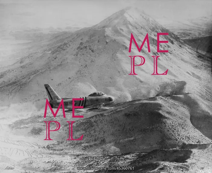 : F-86 Sabre Jet against a rugged, snow covered mountain : F-86 Sabre Jet against a rugged, snow covered mountain