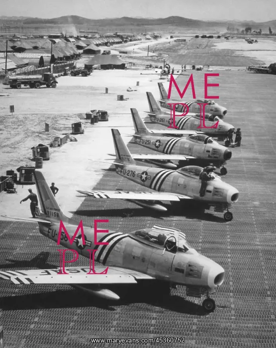 : F-86 Sabre Jets on the flight line getting ready : F-86 Sabre Jets on the flight line getting ready