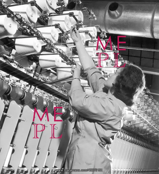 : Factory employee checks large Spinning Machine : Factory employee checks large Spinning Machine