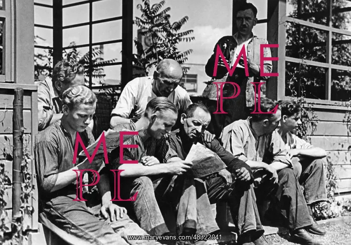 : Factory worker during lunch break, 1935 : Factory worker during lunch break, 1935