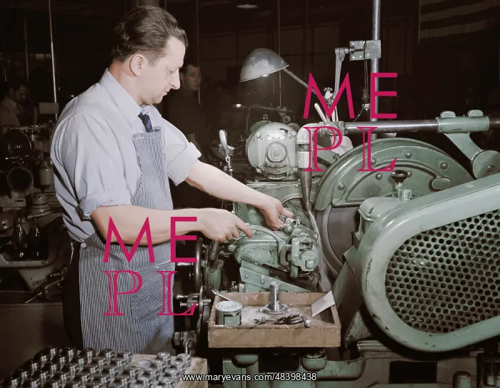: Factory worker making spring collets to further : Factory worker making spring collets to further