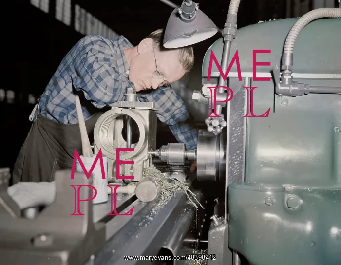 : Factory worker producing 37mm guns and gun mounts, 1942 : Factory worker producing 37mm guns and gun mounts, 1942