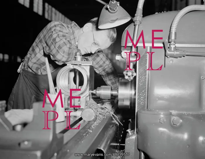 : Factory worker producing 37mm guns and gun mounts, 1942 : Factory worker producing 37mm guns and gun mounts, 1942