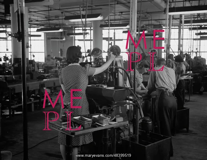 : Factory workers grinding V-blocks on machines, 1942 : Factory workers grinding V-blocks on machines, 1942