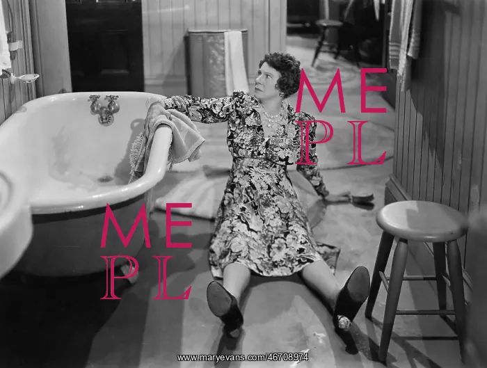 : Fallen woman on floor next to bathtub : Fallen woman on floor next to bathtub