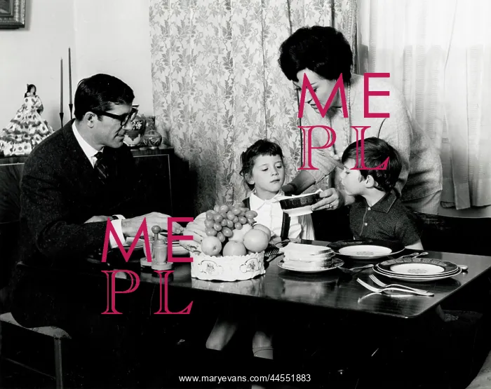 : Family seated at the dinner table 1960s : Family seated at the dinner table 1960s