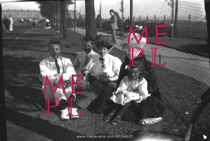  : Family sitting on the grass