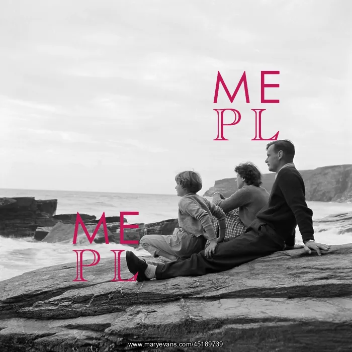: Family sitting on a rock : Family sitting on a rock