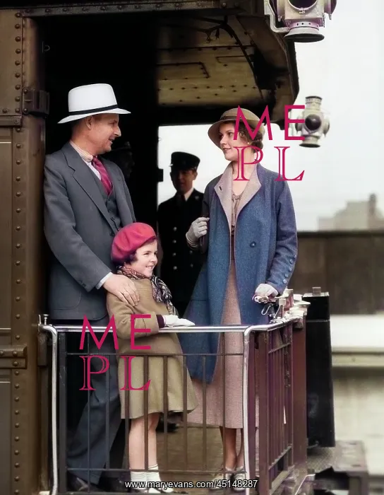 : Family of Three Standing on Back Platform of Passenger : Family of Three Standing on Back Platform of Passenger