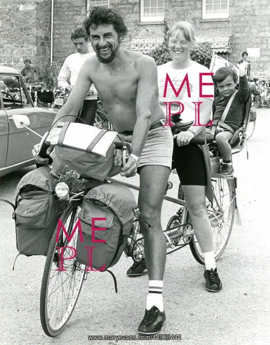 : Family of three on a tandem : Family of three on a tandem