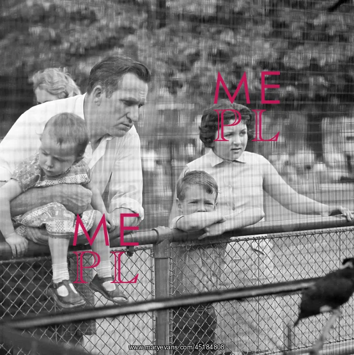 : Family Visiting An Aviary : Family Visiting An Aviary