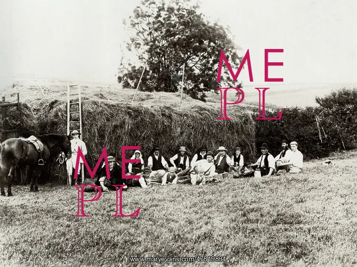 : Farm workers resting beside a haystack, Somerset : Farm workers resting beside a haystack, Somerset