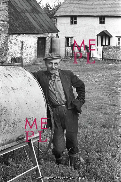 : Farmer in farmyard, Herefordshire : Farmer in farmyard, Herefordshire